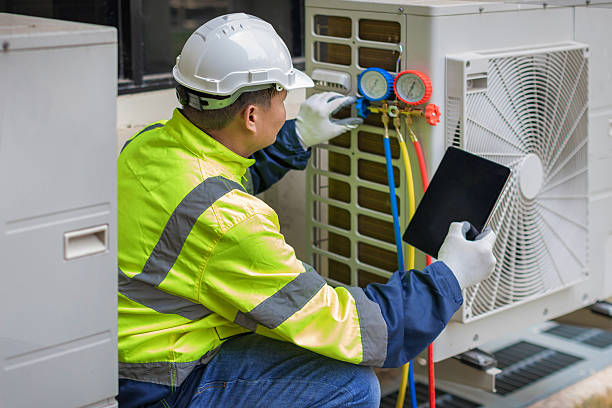 Professional Heat Pump Repair technician working in O Fallon, IL